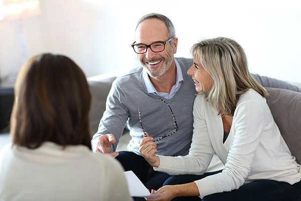 Couple talking to one of our experts about Pensions