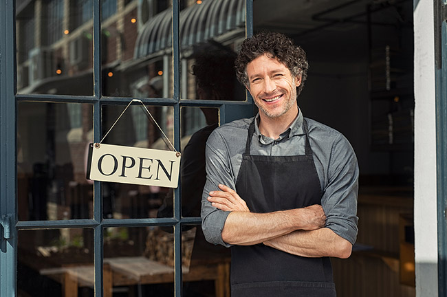 A restaurant Owner happy with his Commerical Insurance from Dolmen
