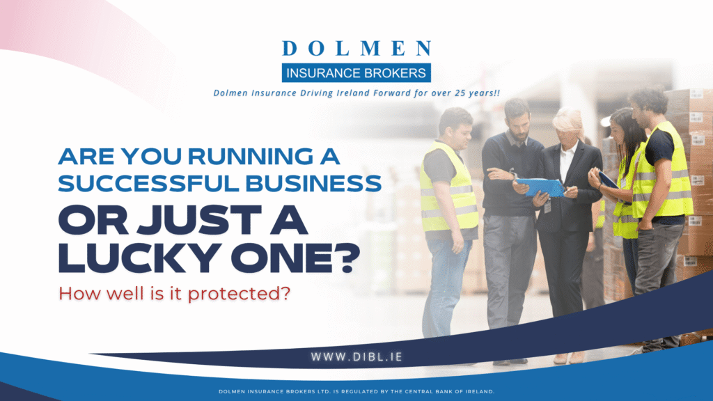 warehouse business workers looking an insurance form on an Ipad